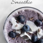 A glass of blueberry coconut smoothie