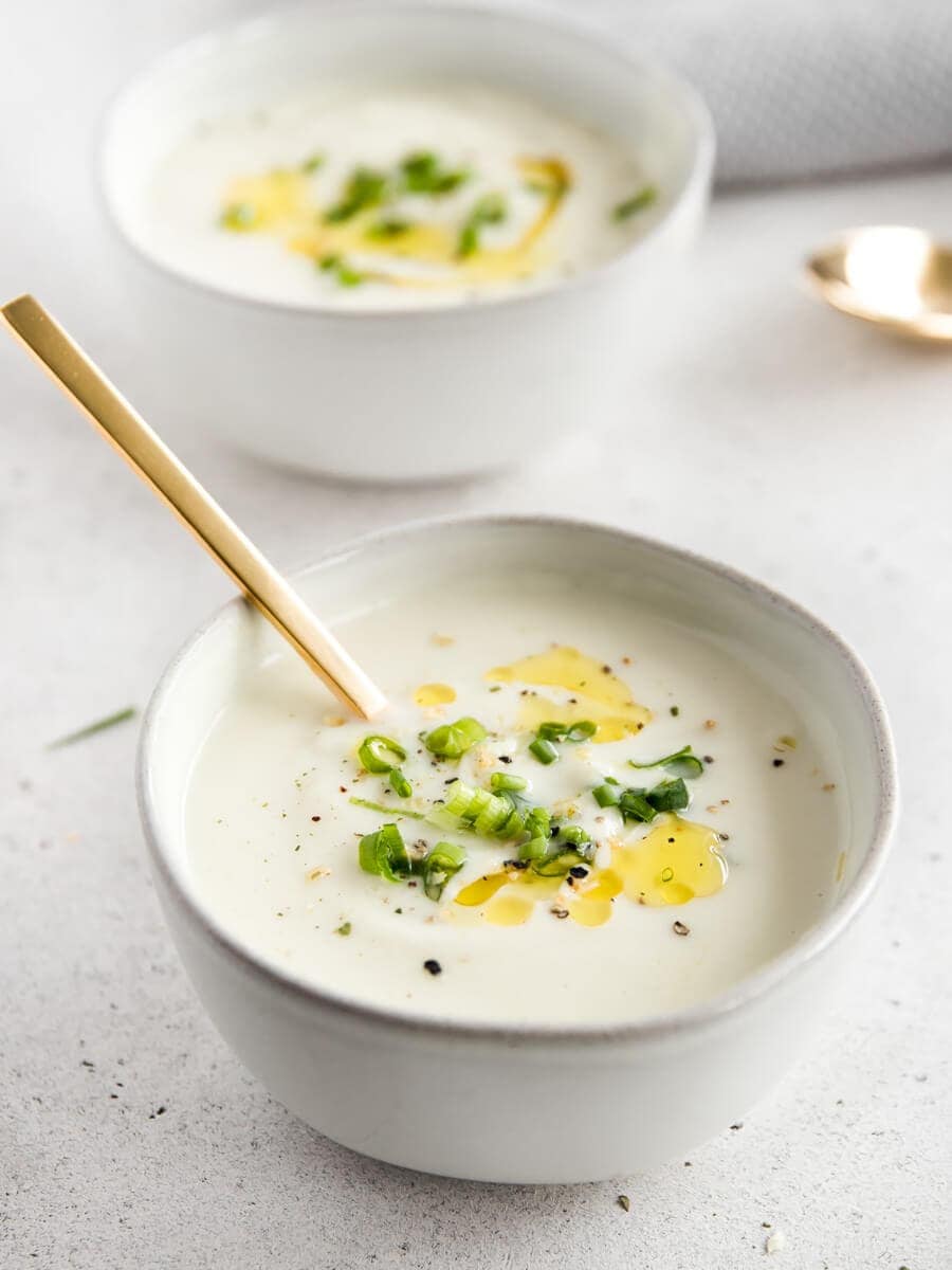 Two bowls of cauliflower soup