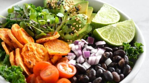 sweet potato and black bean bowls with avocado lime dressing spiced sweet potato & creamy black beans bowl with lime avocado yogurt sauce