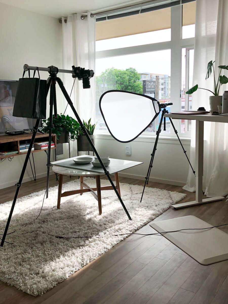 Photography setup in a living room.