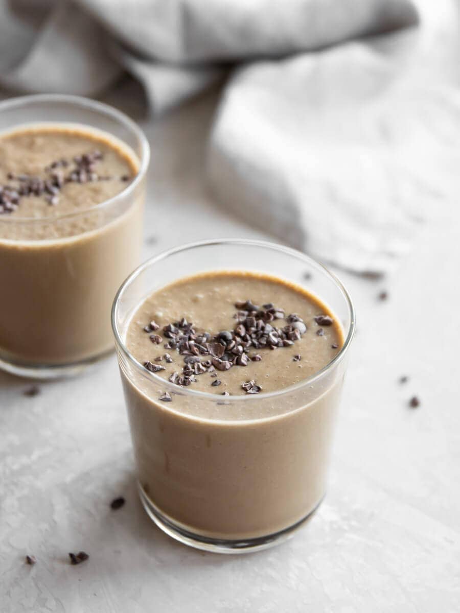 Two glasses of chocolate zucchini smoothie.