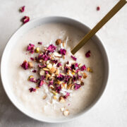 A bowl of Indian kheer sprinkled with rose petals