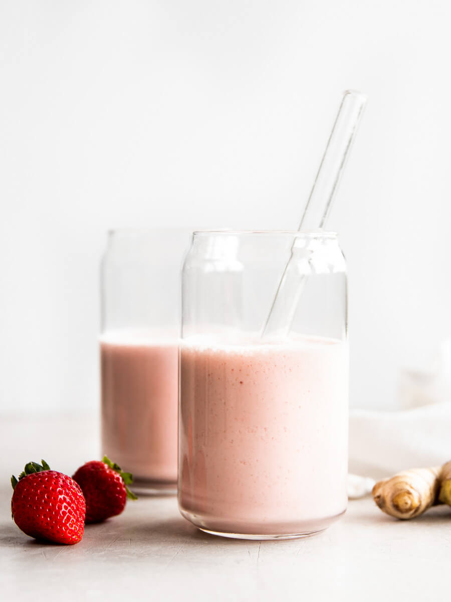 Two glasses of strawberry ginger smoothie.