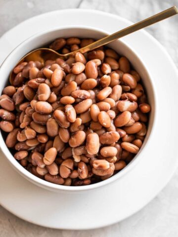 A bowl of cooked pinto beans