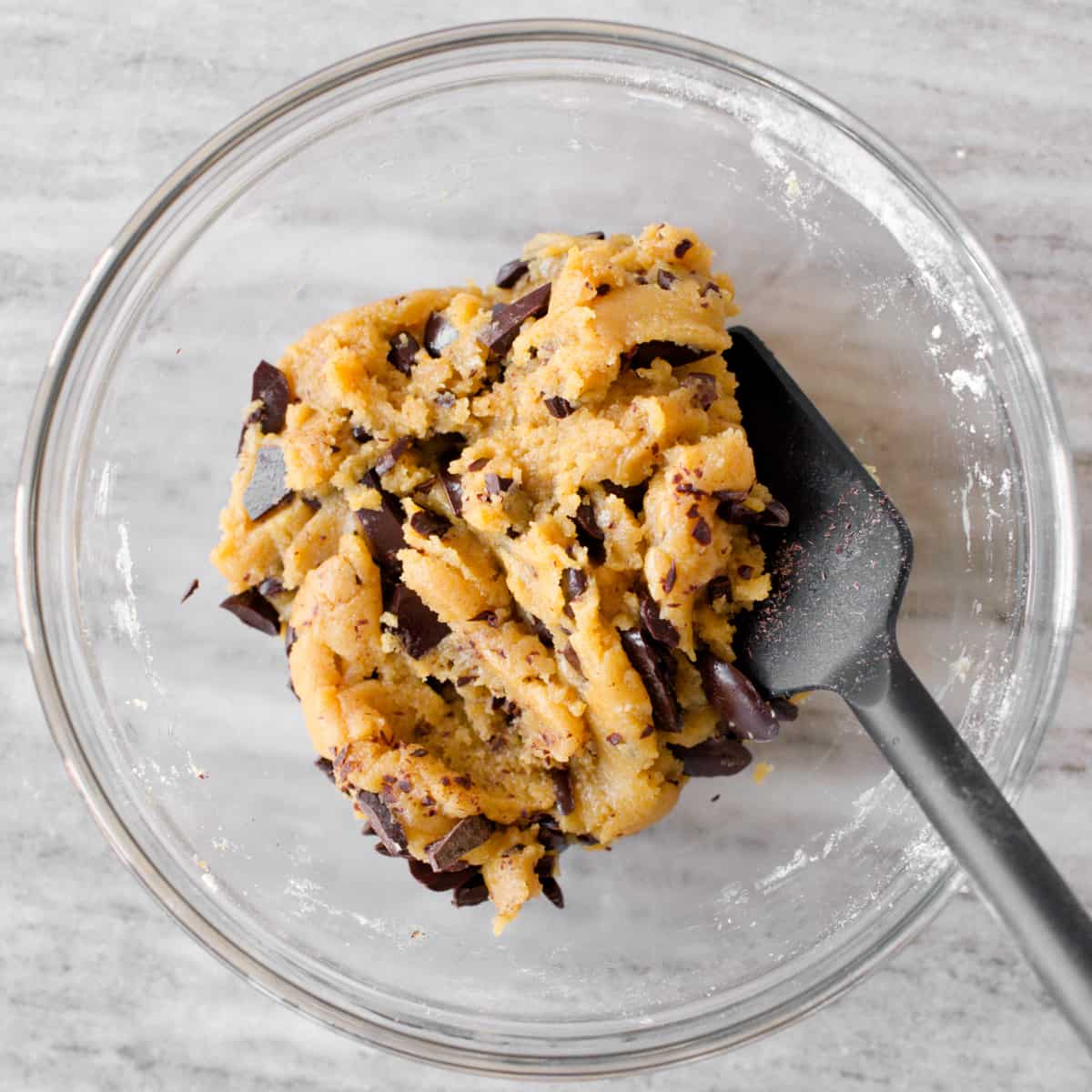 Cookie dough after folding in chocolate chunks.