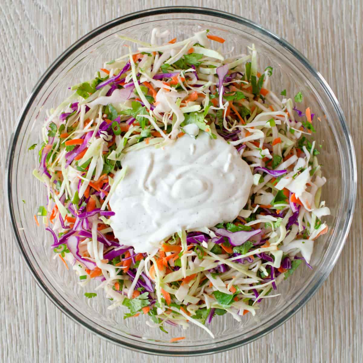 Dressing on taco slaw mixture.