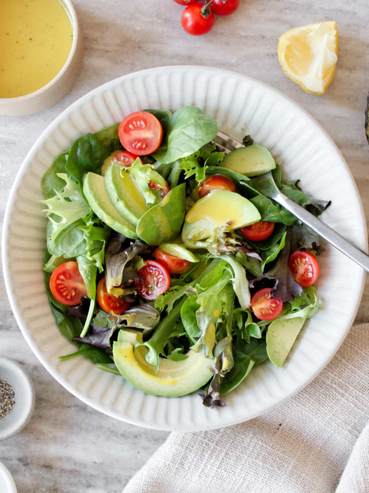 Green salad with honey mustard dressing.