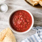 Bowl of homemade salsa with tortilla chips.