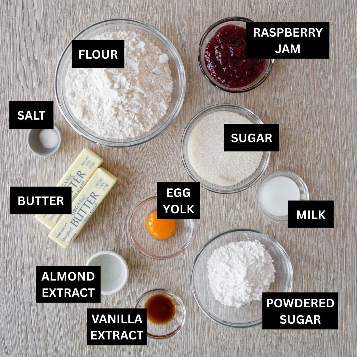 Ingredients for raspberry thumbprint cookies on table.