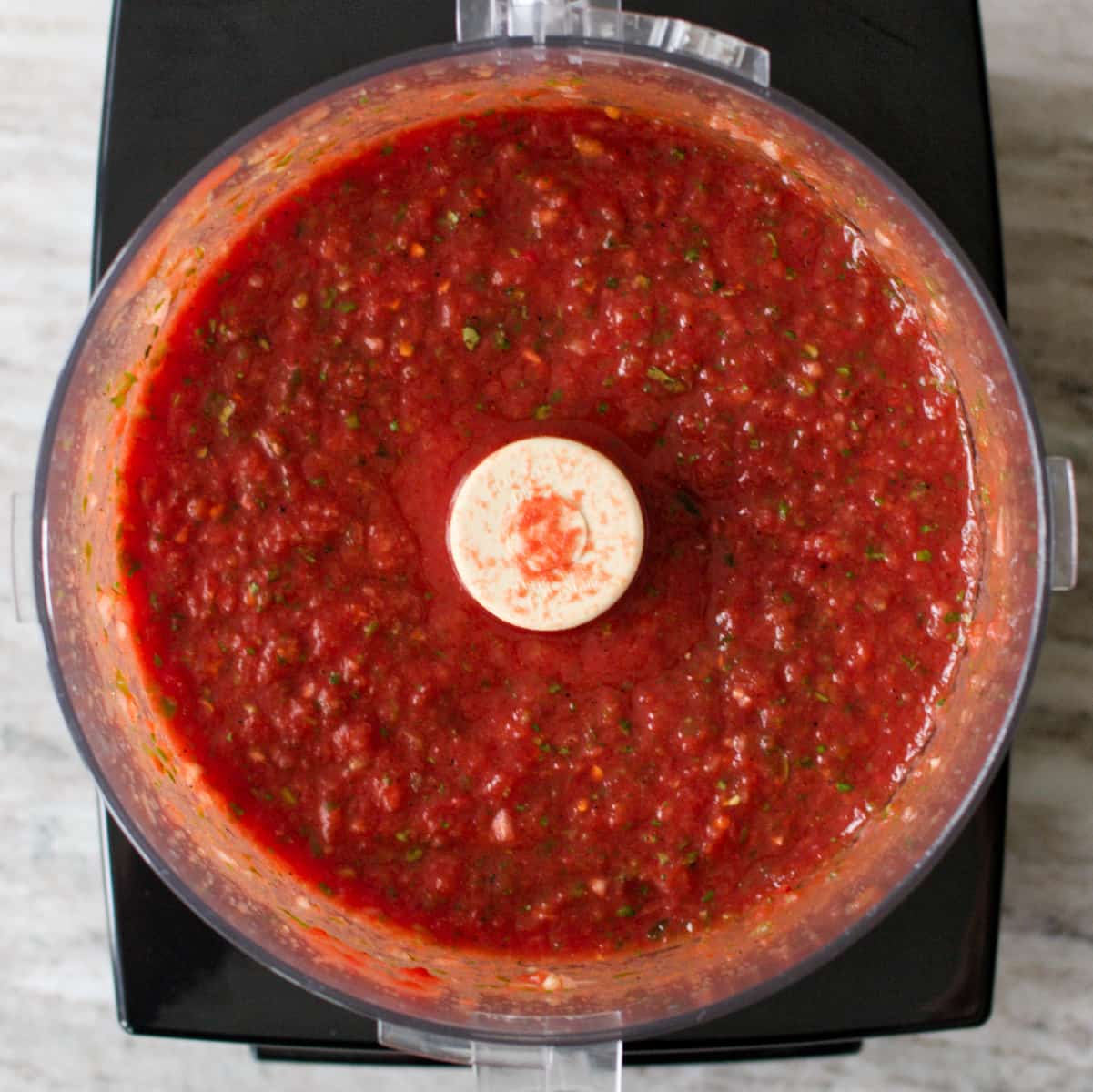 Homemade salsa in the food processor.