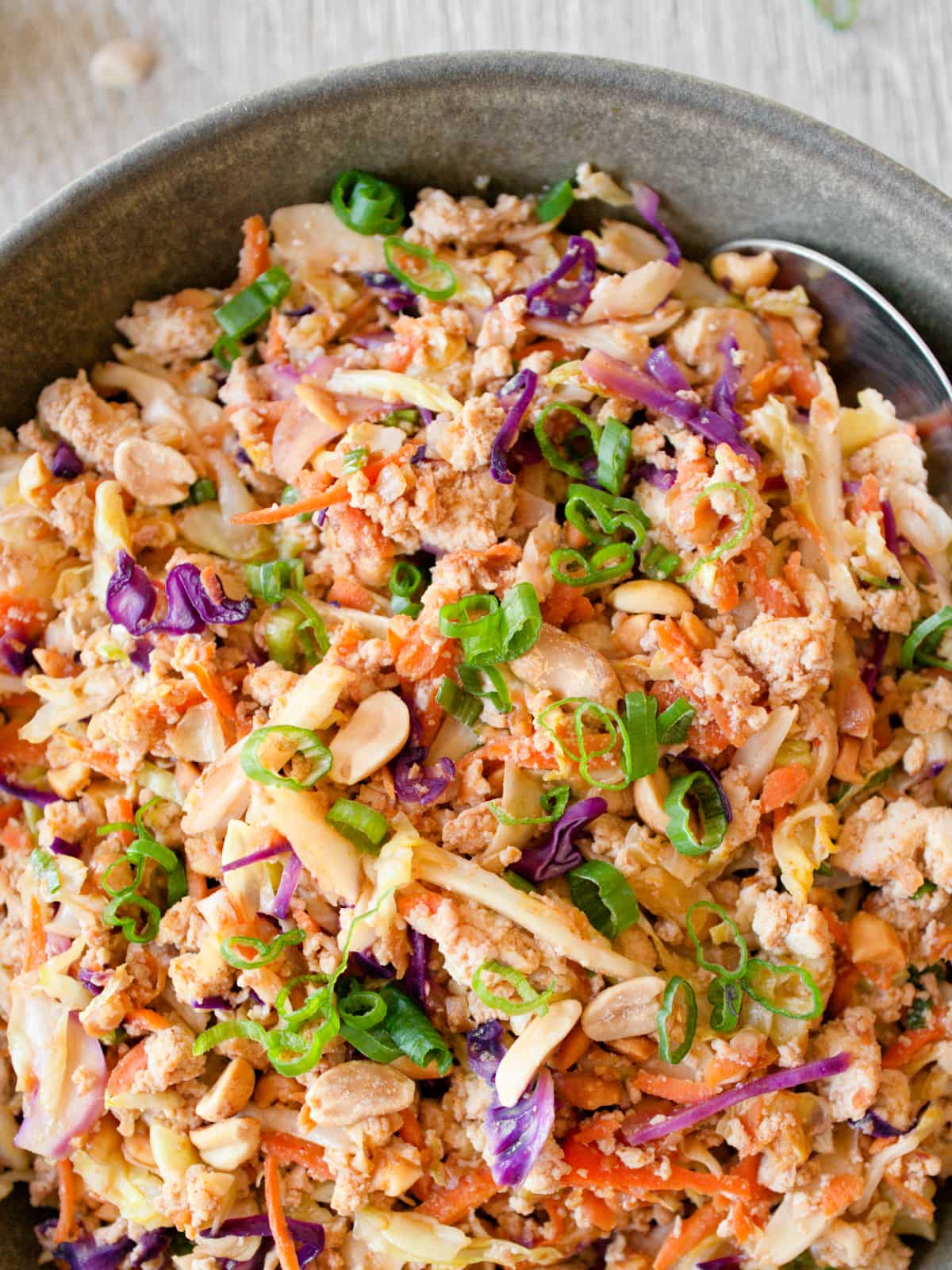 Close-up of egg roll in a bowl.