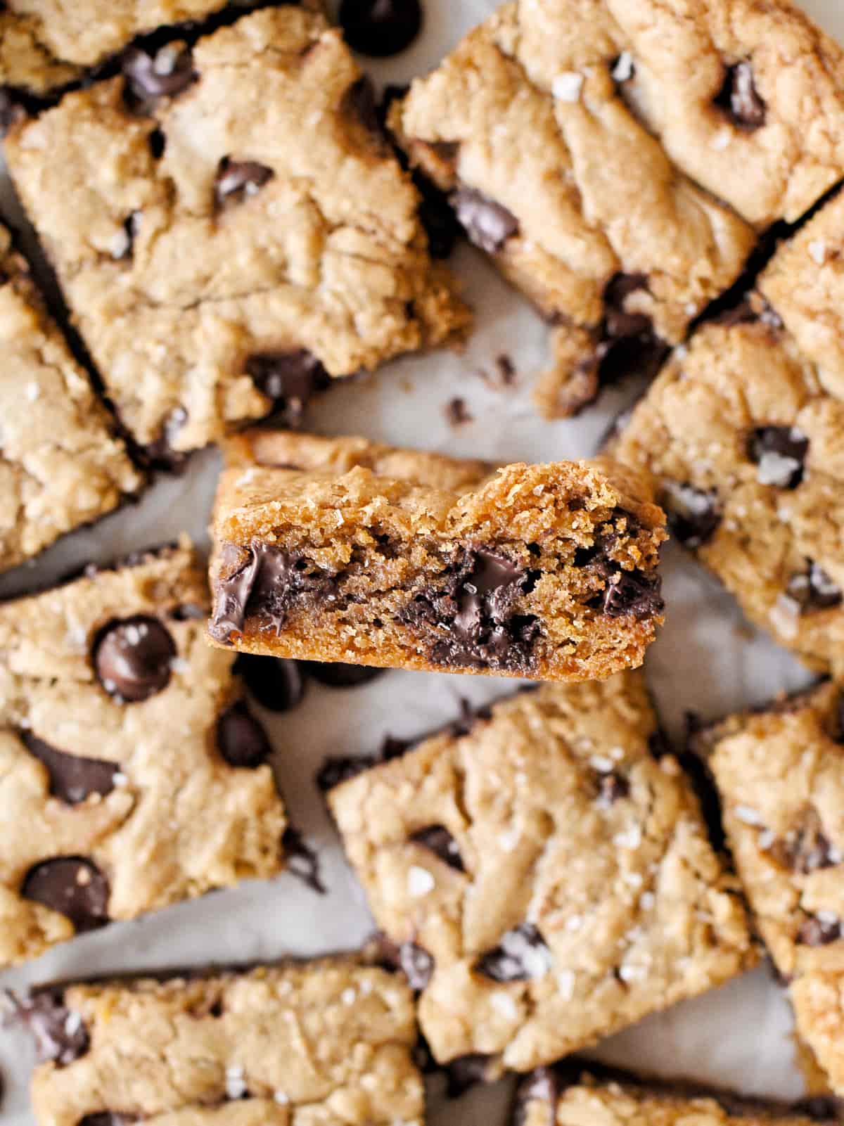 Close-up of chocolate chip cookie bar on its side.
