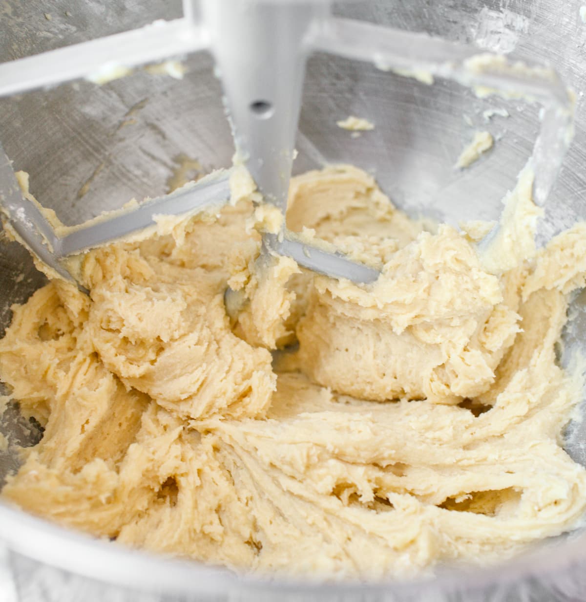 Cookie dough mixing in stand mixer.