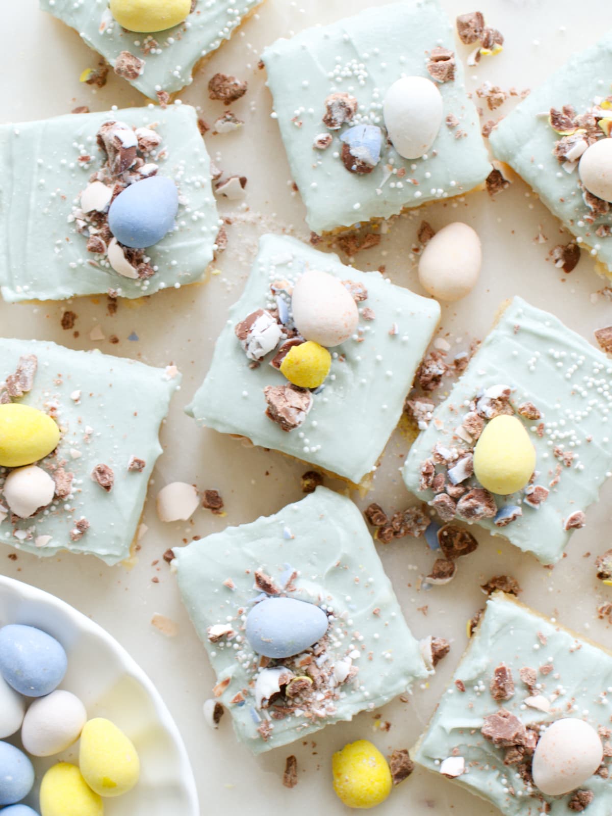 Easter sugar cookie bars decorated with Cadbury eggs.