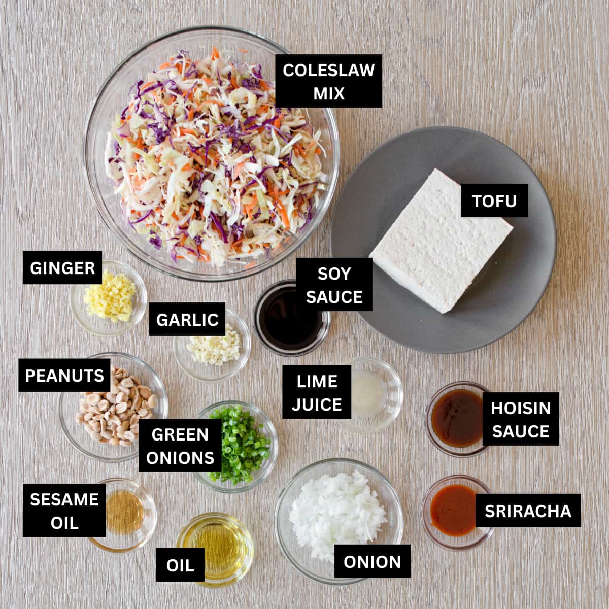 Ingredients for egg roll in a bowl with coleslaw mix.