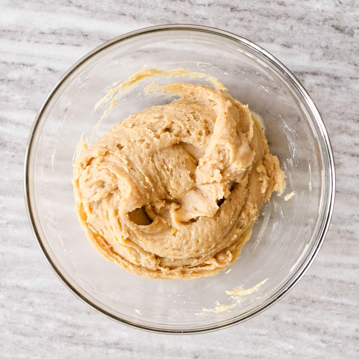 Dry and wet ingredients mixed in large mixing bowl.