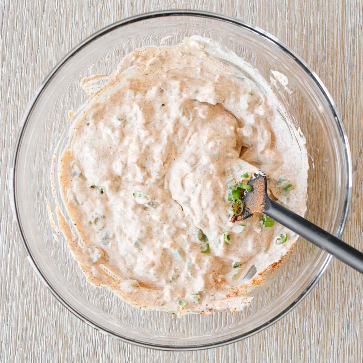 Mixture of corn dip ingredients and seasoning.